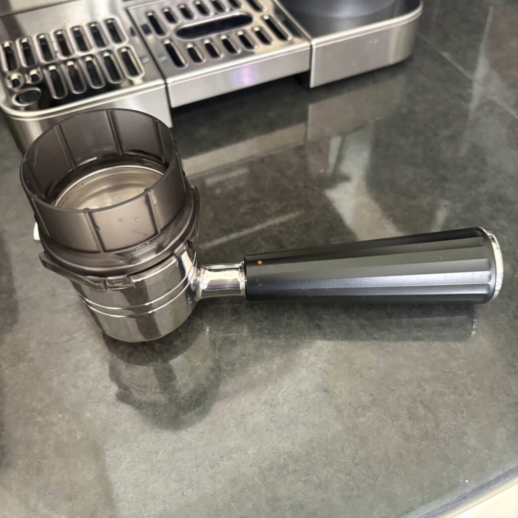 Portafilter with Funnel and Basket Installed