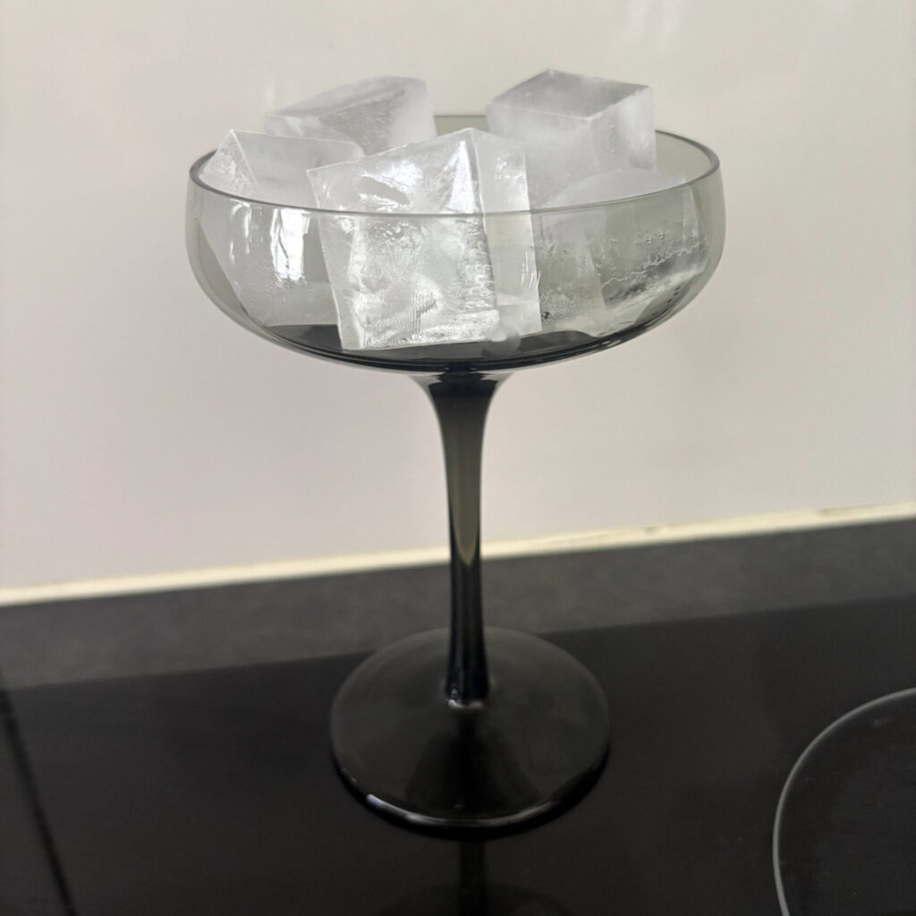 The Best Hazelnut Espresso Martini Recipe ice in martini glass