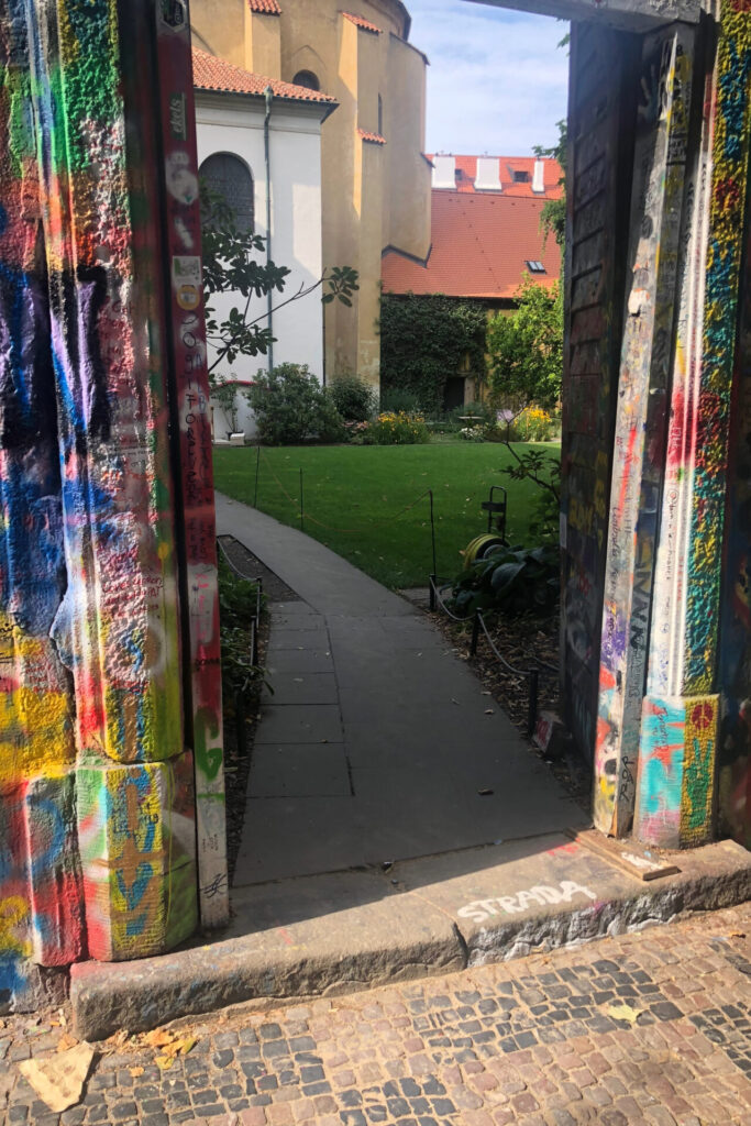 Entrance to Artisème behind the John Lennon Wall